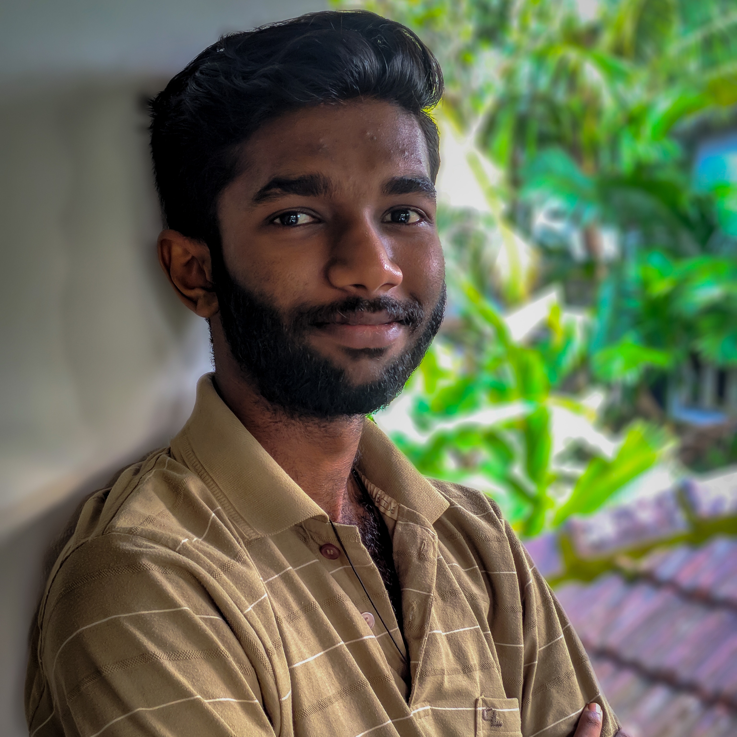 Naveen M