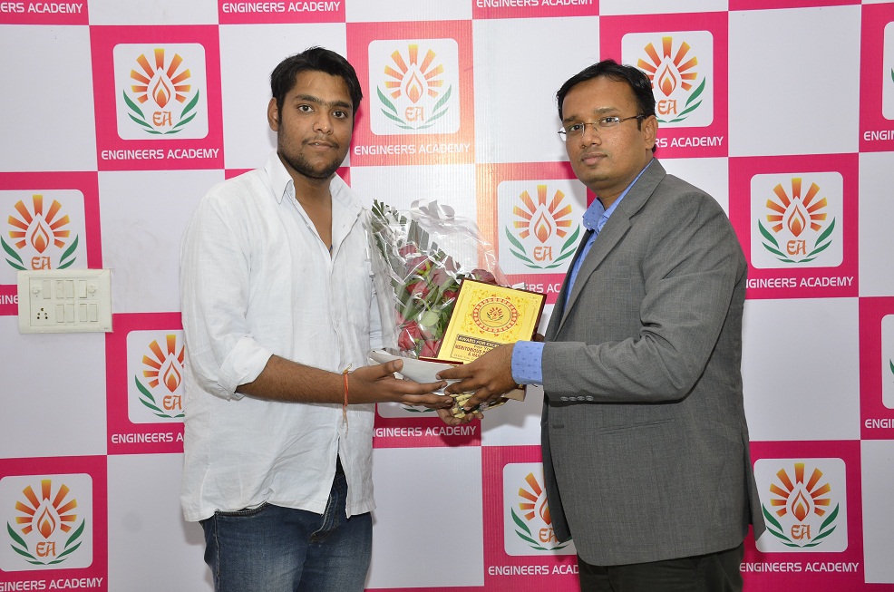 Engineers Academy RECEIVING AN AWARD photo 1